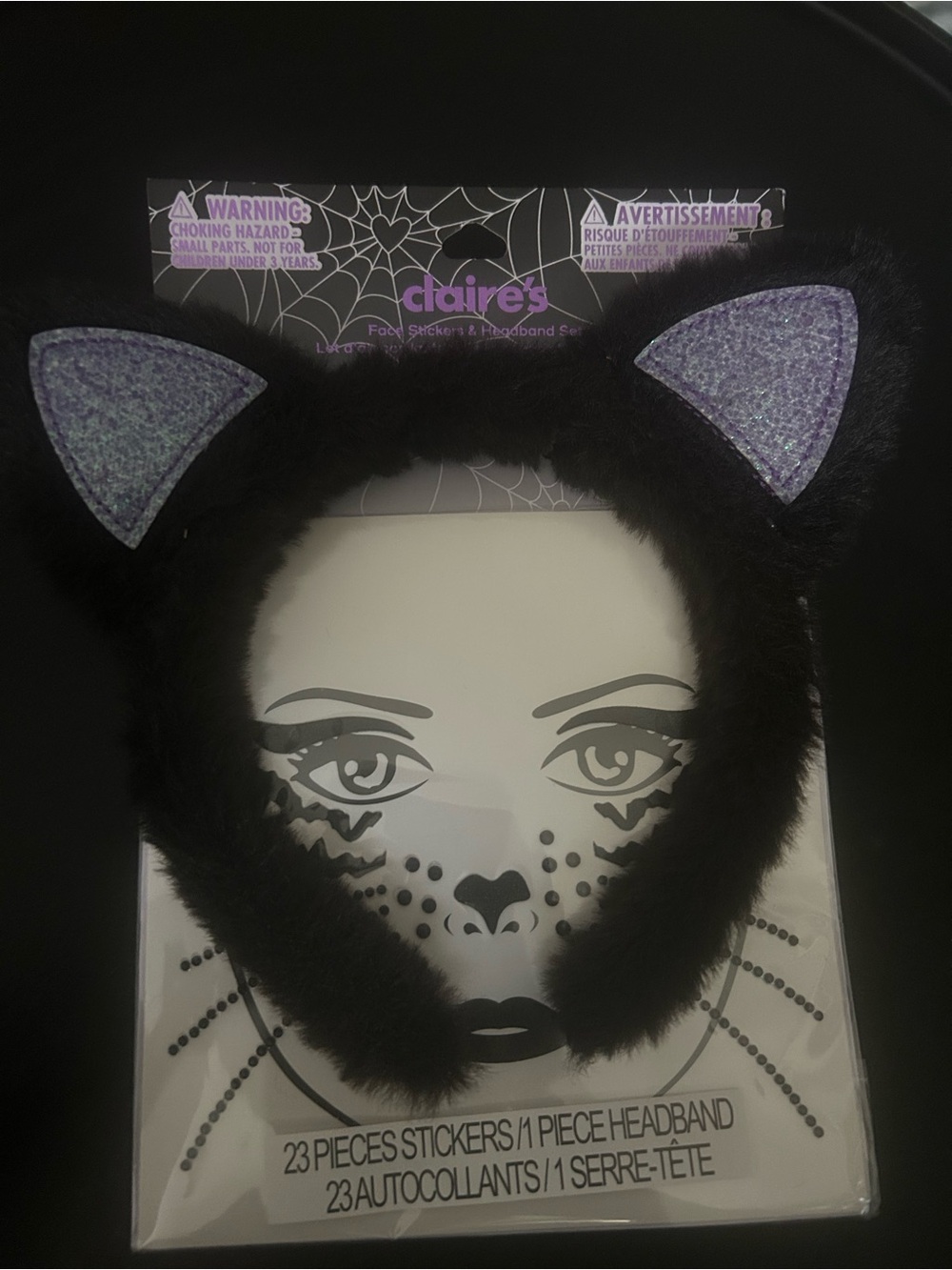 Claire's Black Fuzzy Cat Ear Headband with Purple Glitter Inners